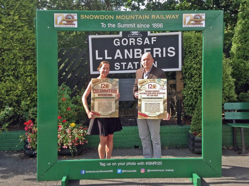 Snowdon Mountain Railway staff pose with a giant photo frame they’ll be taking to the summit as part of the railway’s upcoming 120th anniversary celebration weekend. Pictured are (l-r): marketing executive Carrie Dugdale and general manager Alan Kendall.