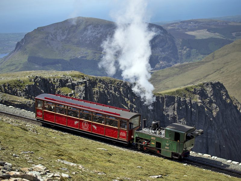 Snowdon Mountain Railway's steam engine Enid nears the summit of Snowdon – credit Mike Spencer
